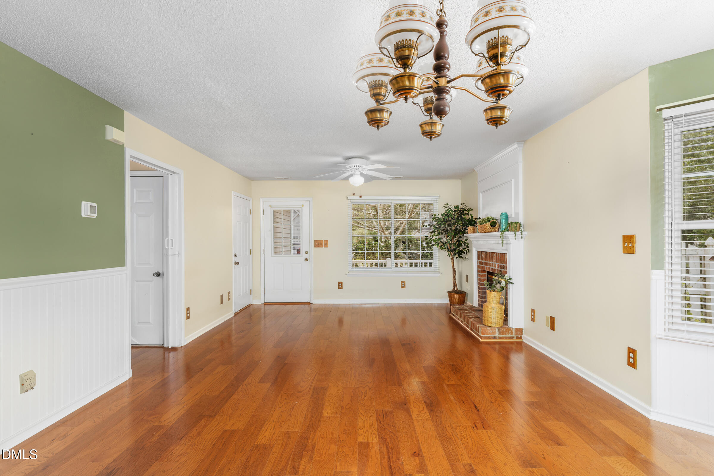 6 Tinsbury Place Durham, NC 27713 - Photo 6 of 30 a view of a room with a window and wooden floor