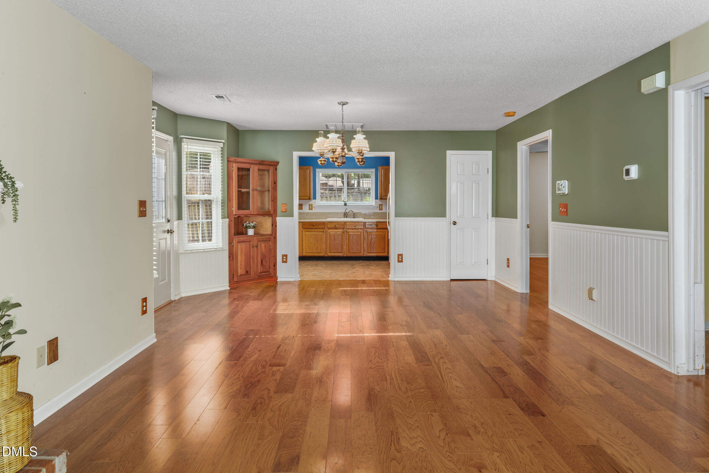 6 Tinsbury Place Durham, NC 27713 - Photo 9 of 30 wooden floor in an empty room with a window