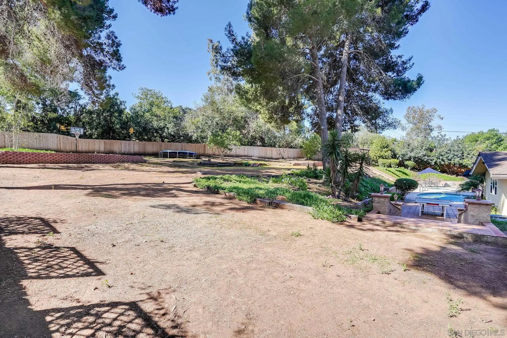 13611 Rostrata Road Poway, CA 92064 - Photo 54 of 67 front view of a house with a yard