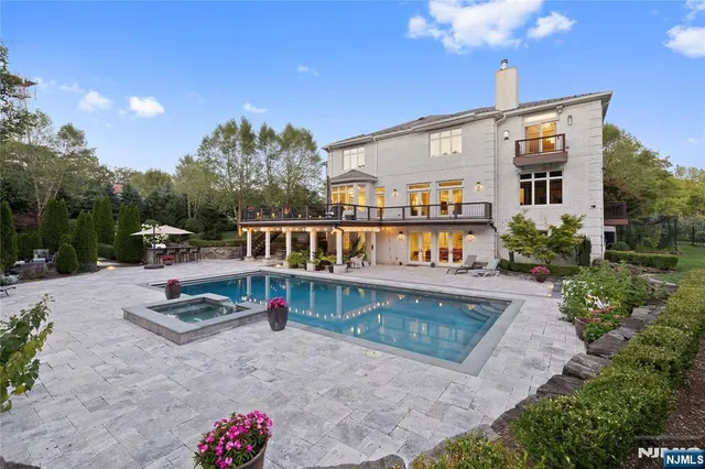 a view of a house with roof deck