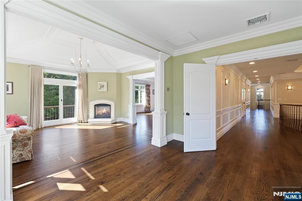 417 Rte 9W Alpine, NJ 07620 - Photo 16 of 50 a view of an entryway with wooden floor and a front door