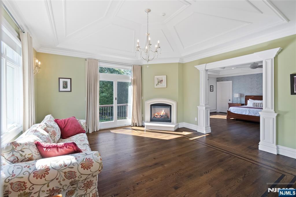 417 Rte 9W Alpine, NJ 07620 - Photo 17 of 50 a living room with furniture and a fireplace