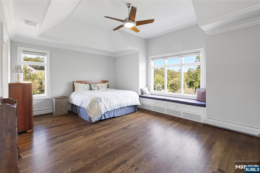 417 Rte 9W Alpine, NJ 07620 - Photo 24 of 50 a bedroom with a bed and a window