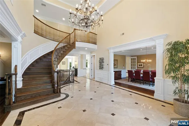 a view of hall way with furniture