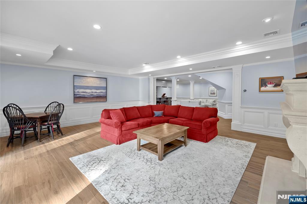 417 Rte 9W Alpine, NJ 07620 - Photo 31 of 50 a living room with furniture and wooden floor