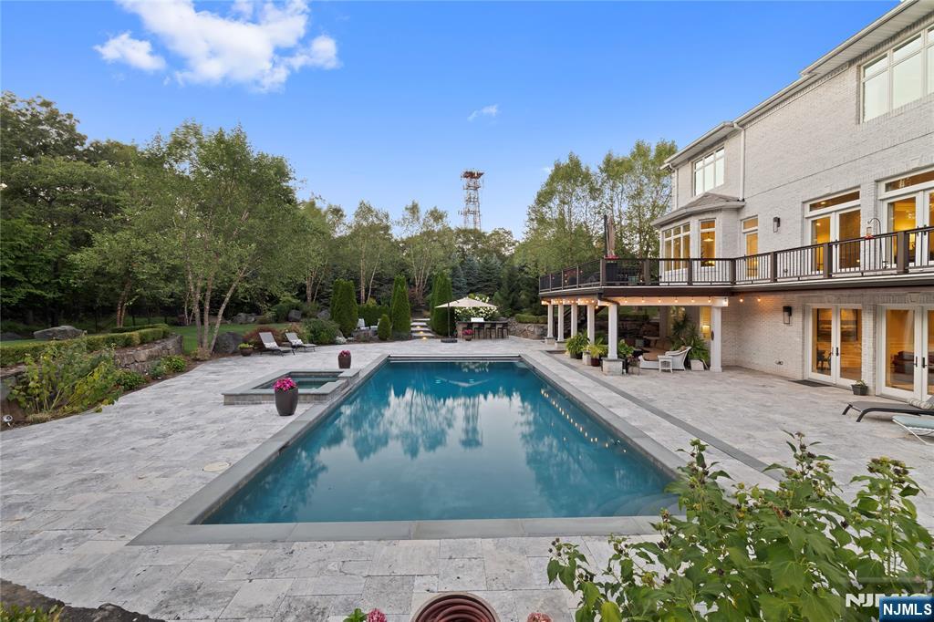 417 Rte 9W Alpine, NJ 07620 - Photo 46 of 50 swimming pool view with a garden space