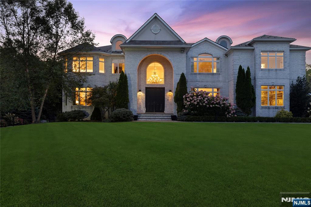 417 Rte 9W Alpine, NJ 07620 - Photo 48 of 50 a front view of a house with garden