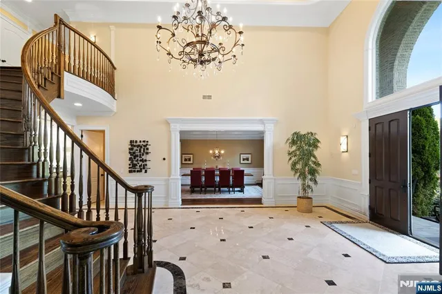 a view of a hallway view with staircase