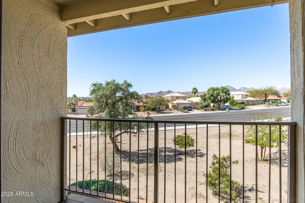 a view of a balcony with city view