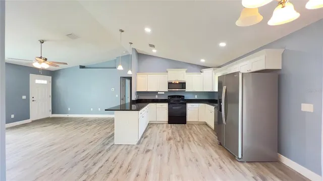 a large kitchen with a lot of counter space