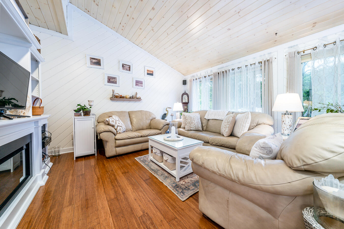 23 Redwood Circle Mashpee, MA 02649 - Photo 17 of 40 a living room with furniture and a fireplace