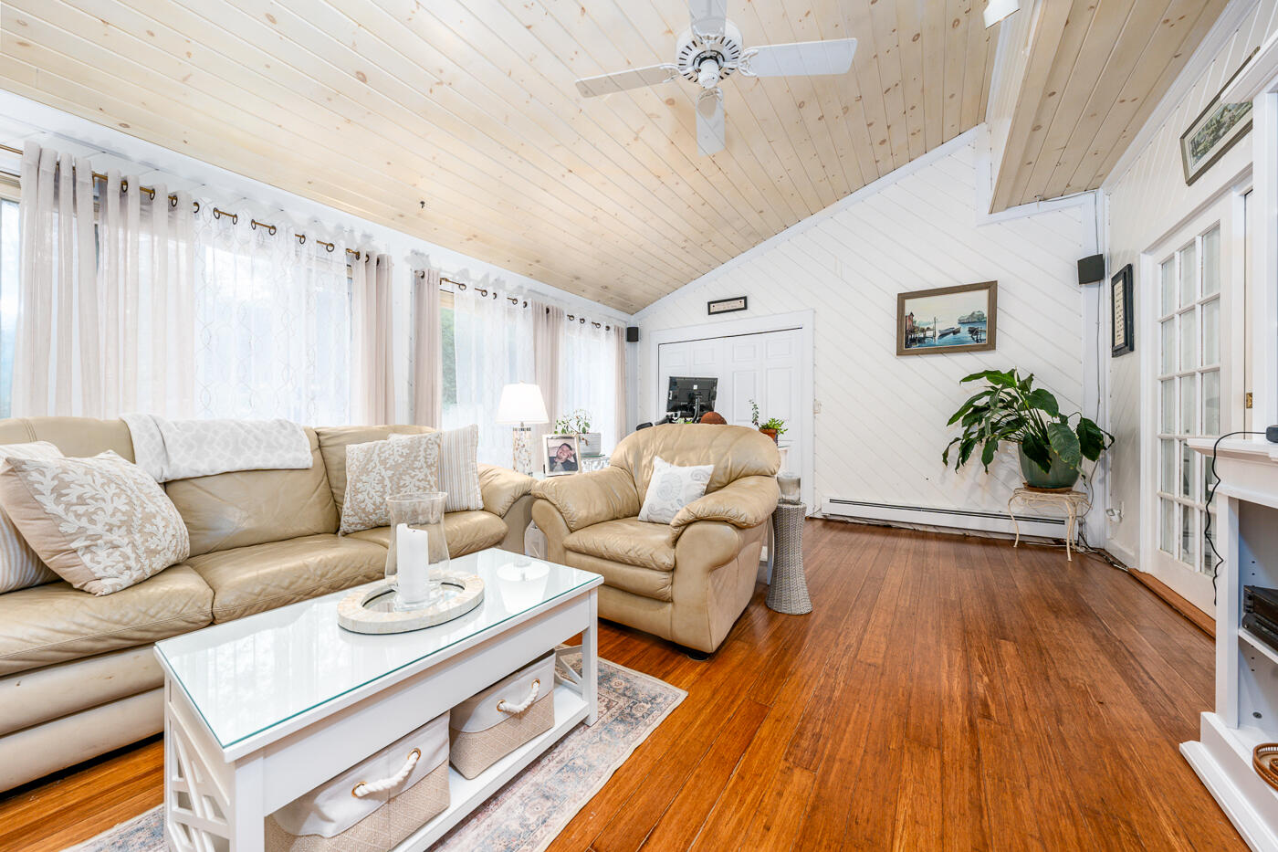 23 Redwood Circle Mashpee, MA 02649 - Photo 19 of 40 a living room with furniture and a large window