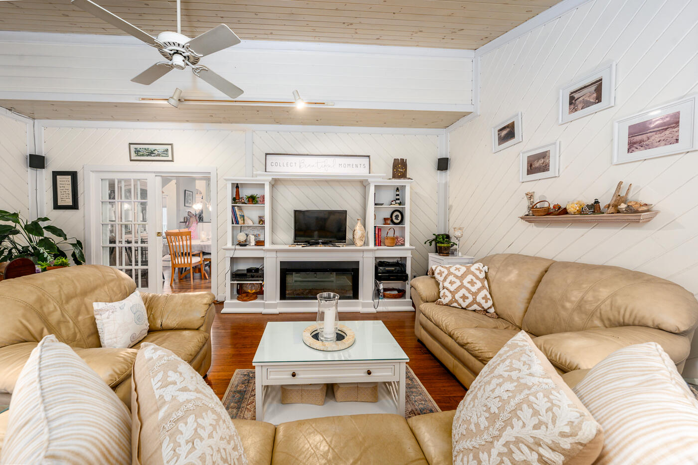 23 Redwood Circle Mashpee, MA 02649 - Photo 20 of 40 a living room with furniture and a flat screen tv