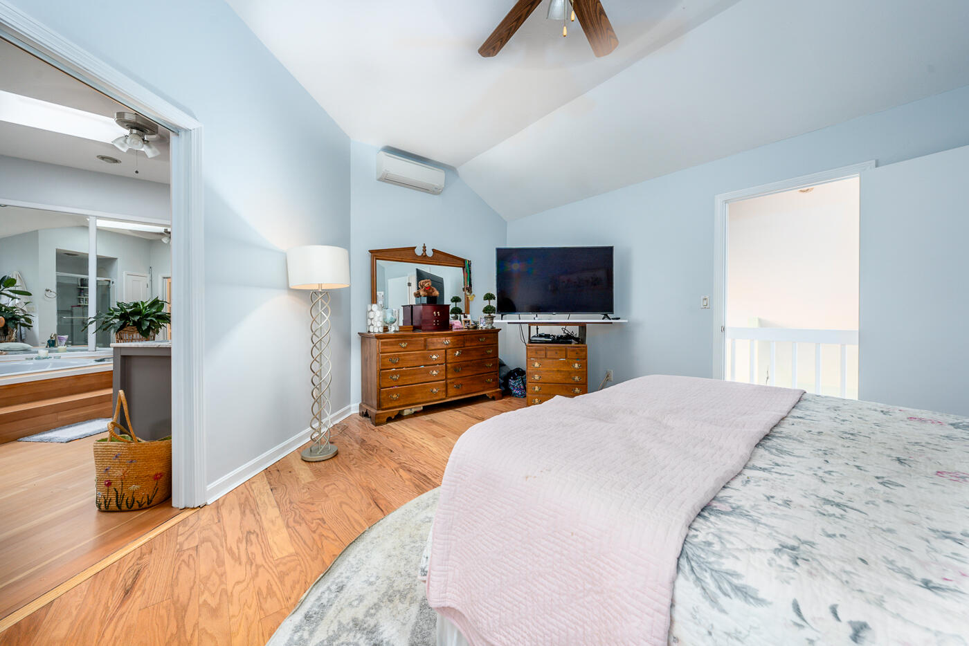 23 Redwood Circle Mashpee, MA 02649 - Photo 24 of 40 a bedroom with a bed and flat screen tv