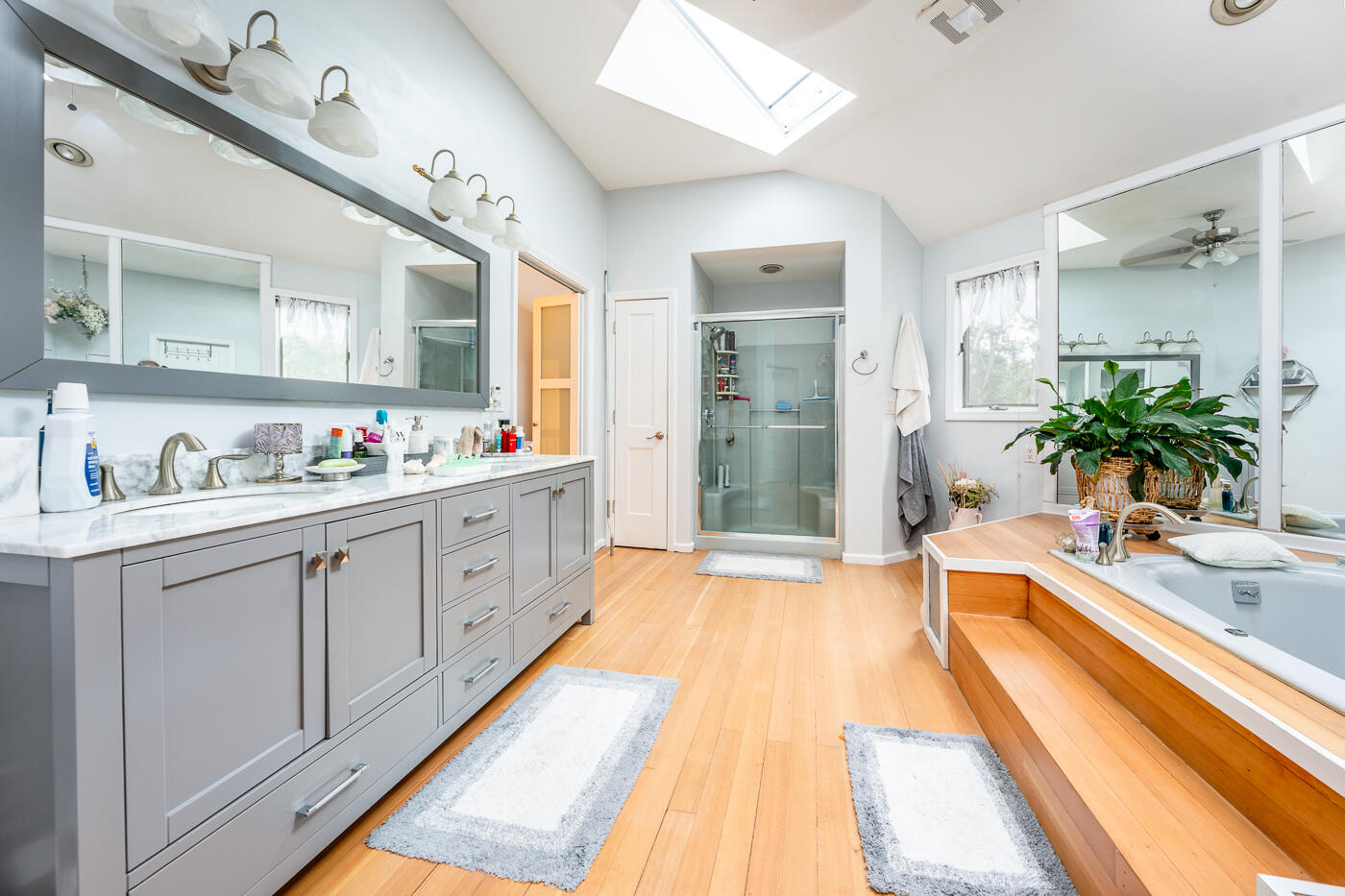 23 Redwood Circle Mashpee, MA 02649 - Photo 26 of 40 a large white kitchen with a large counter top and sink