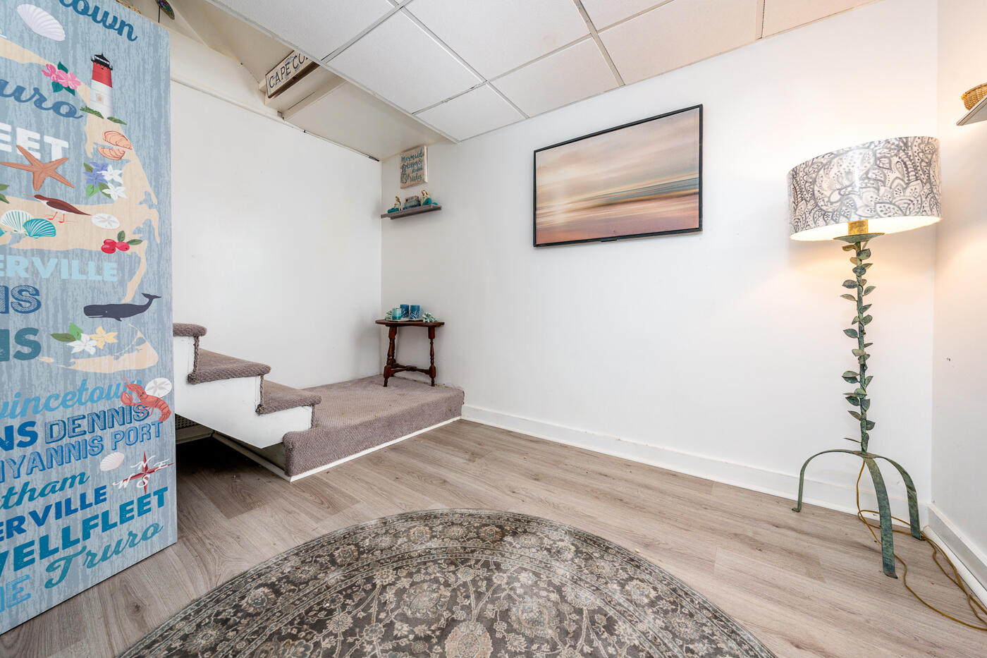 23 Redwood Circle Mashpee, MA 02649 - Photo 31 of 40 a bedroom with a bed and wooden floor