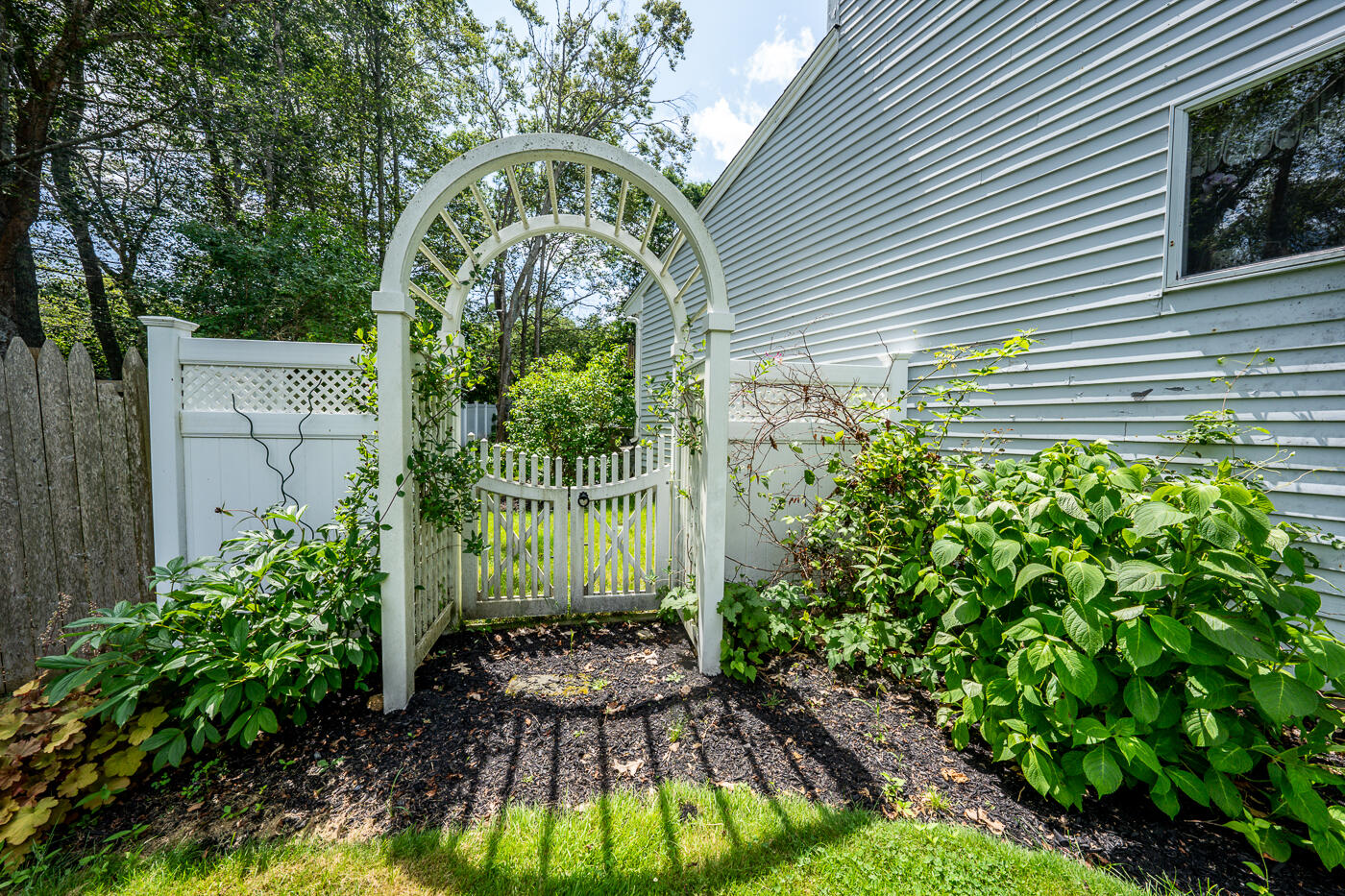 23 Redwood Circle Mashpee, MA 02649 - Photo 33 of 40 a backyard of a house with lots of green space