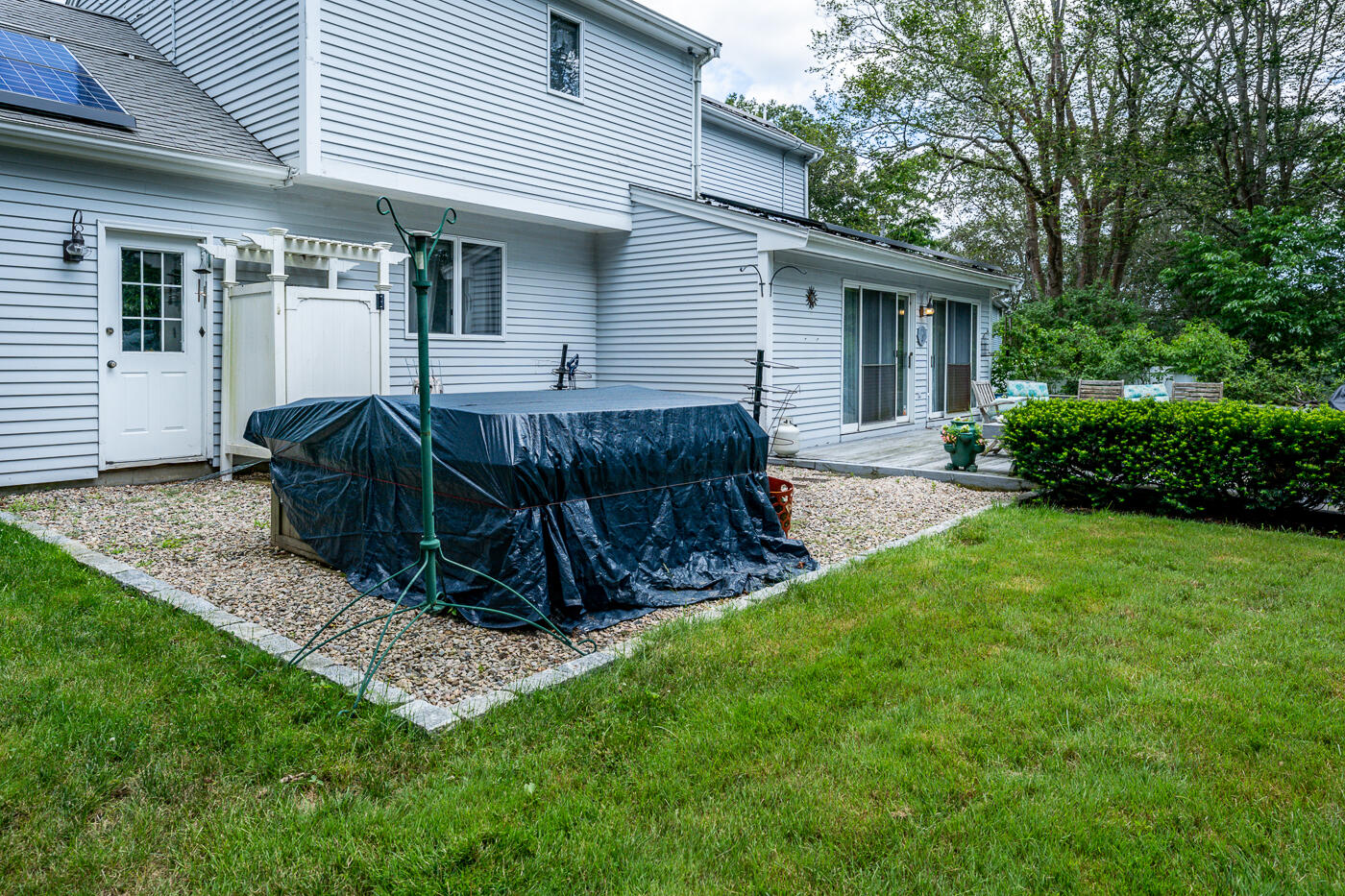 23 Redwood Circle Mashpee, MA 02649 - Photo 35 of 40 a view of backyard with a garden and deck