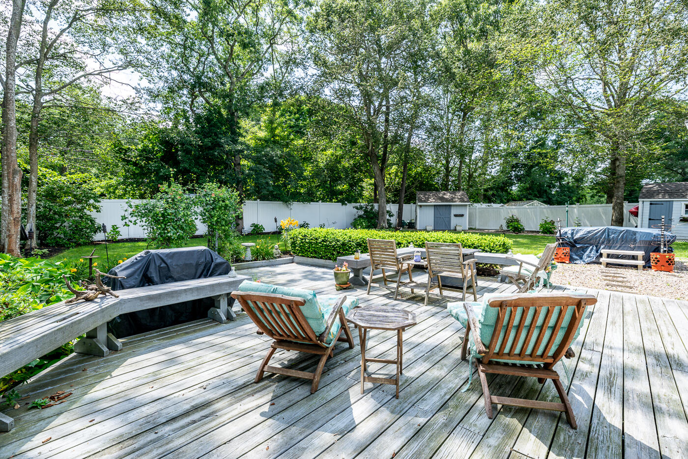 23 Redwood Circle Mashpee, MA 02649 - Photo 38 of 40 a view of a lounge chairs on the deck