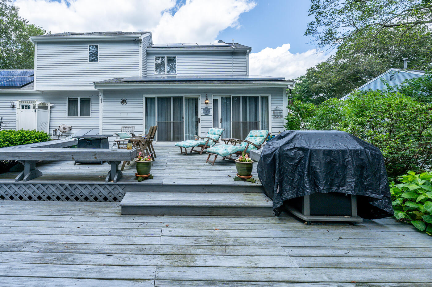 23 Redwood Circle Mashpee, MA 02649 - Photo 39 of 40 a front view of a house with furniture and garden