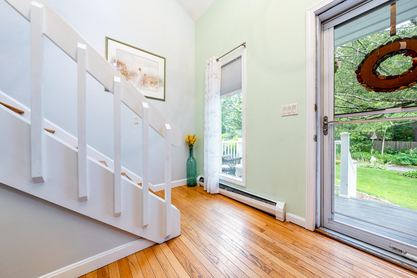 23 Redwood Circle Mashpee, MA 02649 - Photo 6 of 40 a view of an entryway with wooden floor