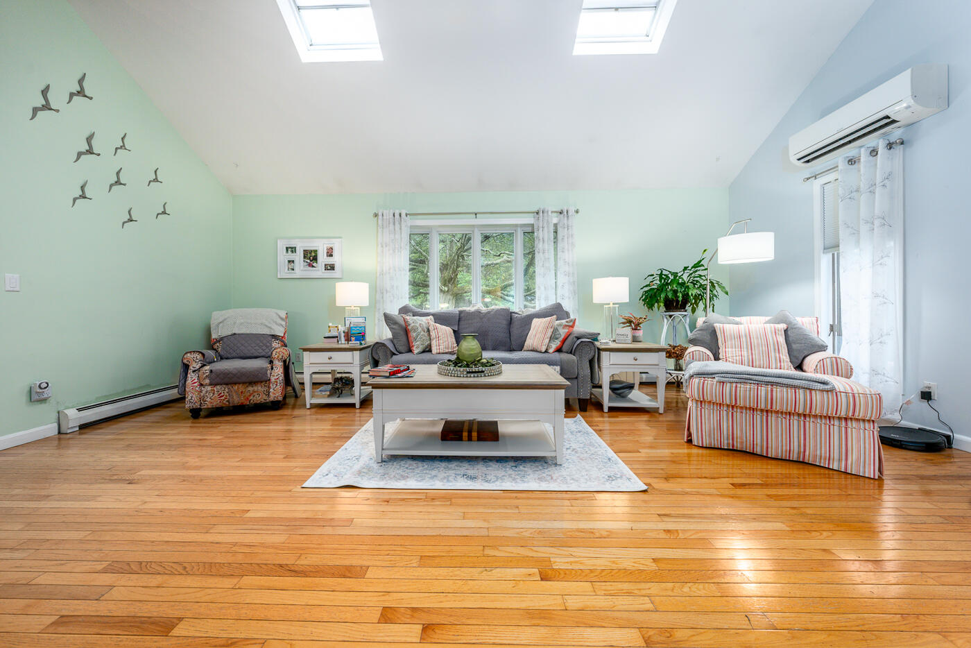 23 Redwood Circle Mashpee, MA 02649 - Photo 9 of 40 a living room with furniture and a large window