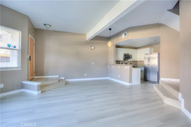 a view of kitchen with wooden floor