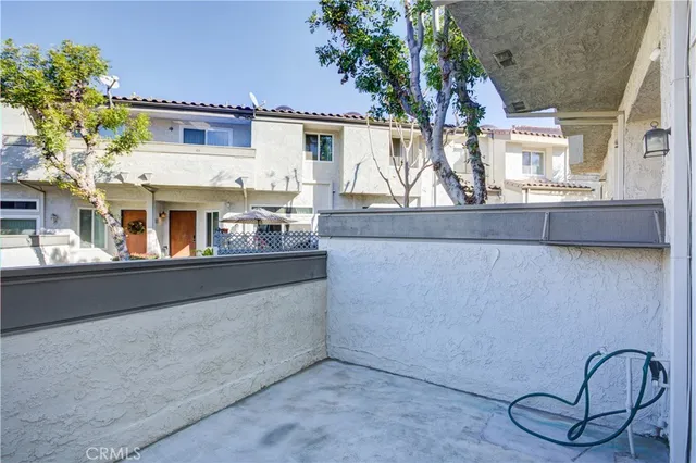 a view of swimming pool from a balcony