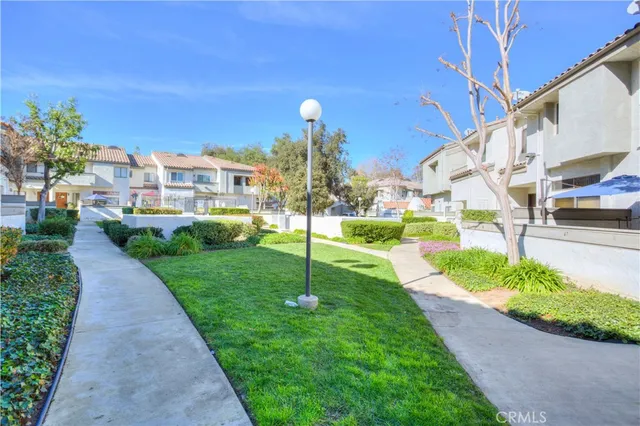 a view of a garden with pathway