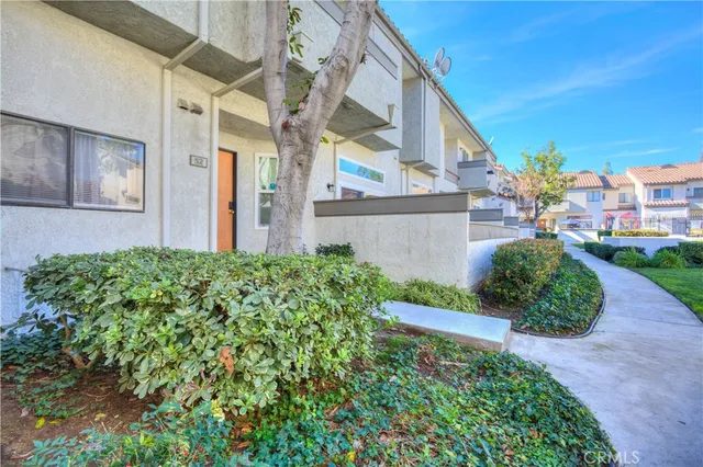 a view of a building with a garden