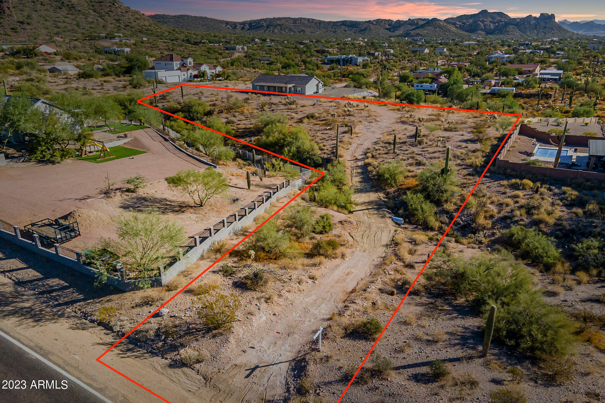 0 North Idaho Road Apache Junction, AZ 85119 - Photo 2 of 24 an aerial view of residential houses and outdoor space