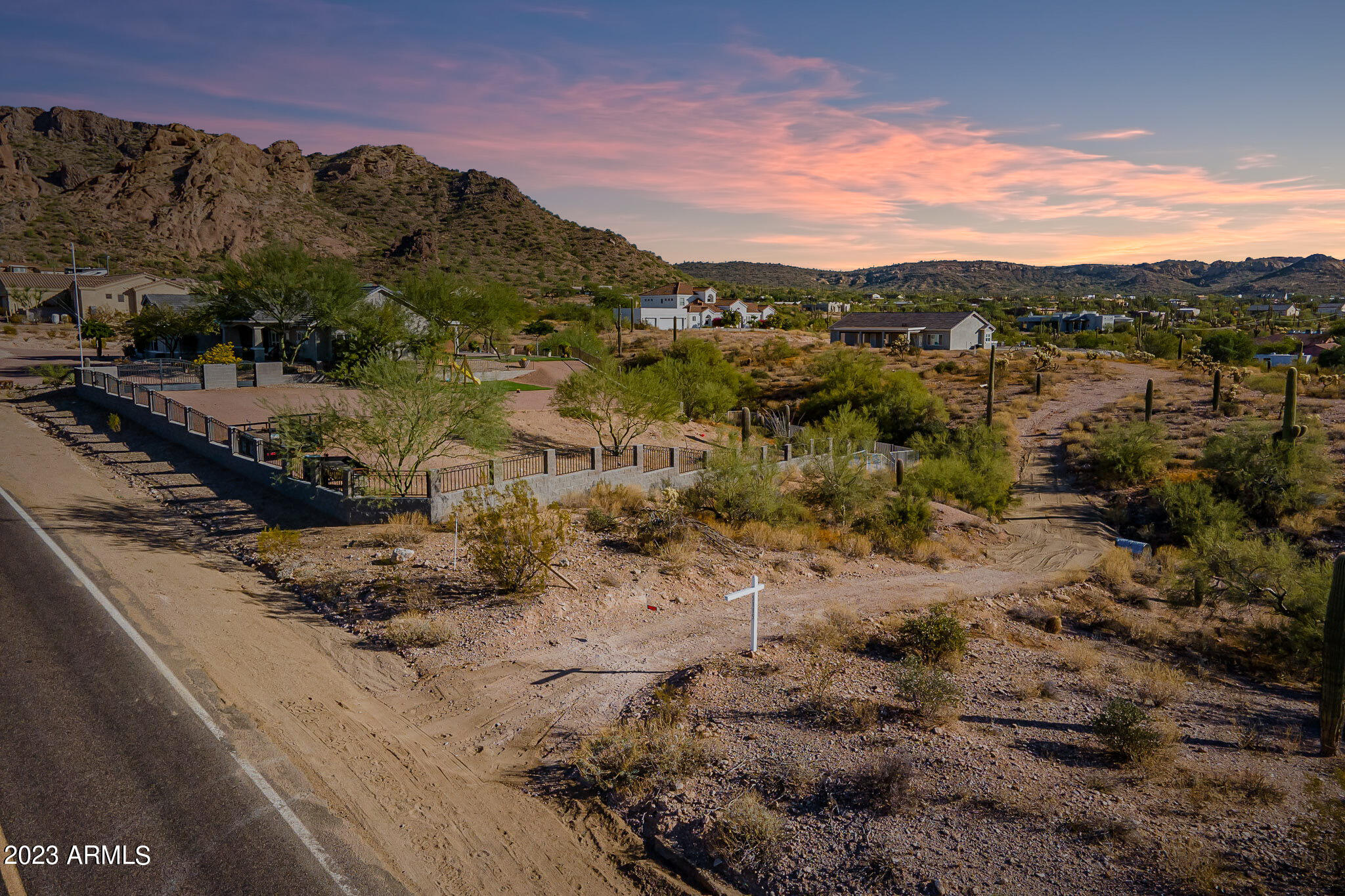 0 North Idaho Road Apache Junction, AZ 85119 - Photo 5 of 24 a view of a town with mountains in the background