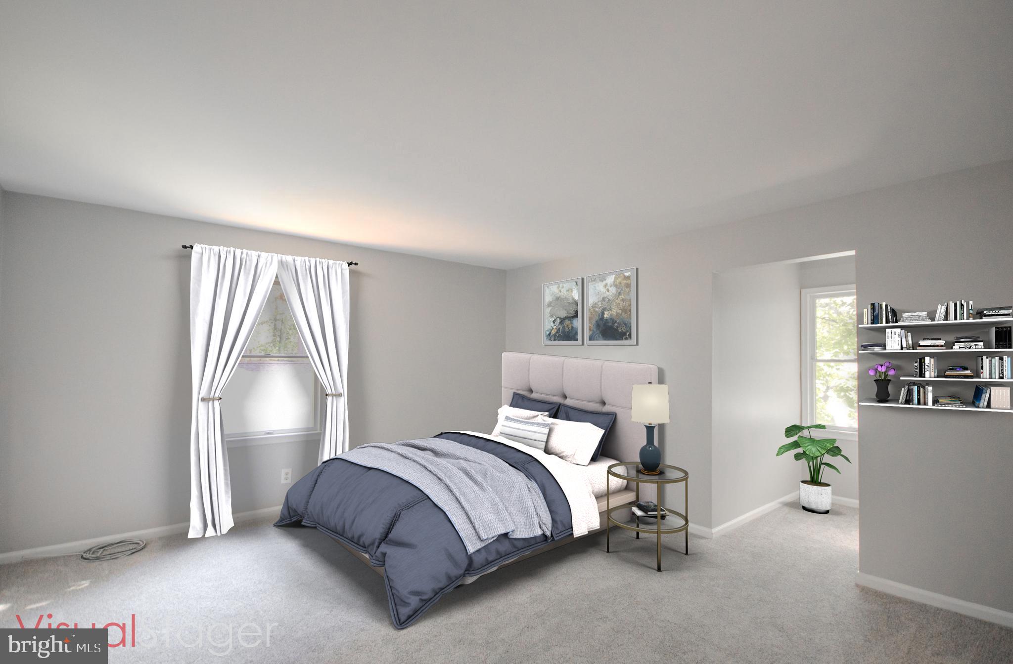 103 Ocean Parkway Ocean Pines, MD 21811 - Photo 19 of 44 a bedroom with a bed and a window