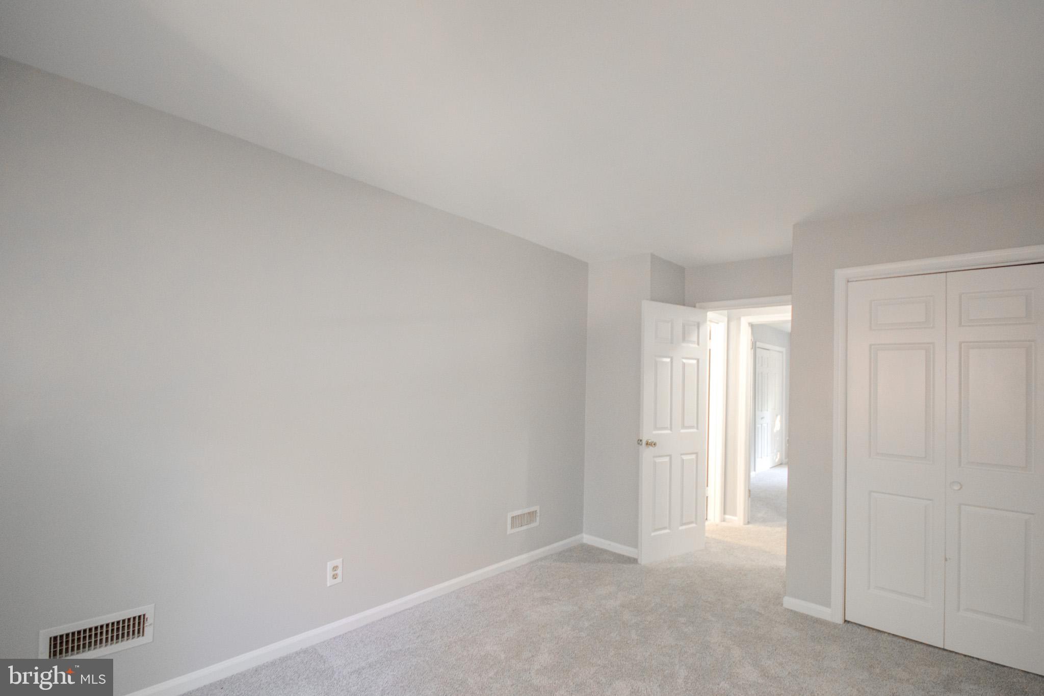 103 Ocean Parkway Ocean Pines, MD 21811 - Photo 26 of 44 a view of an empty room and a window