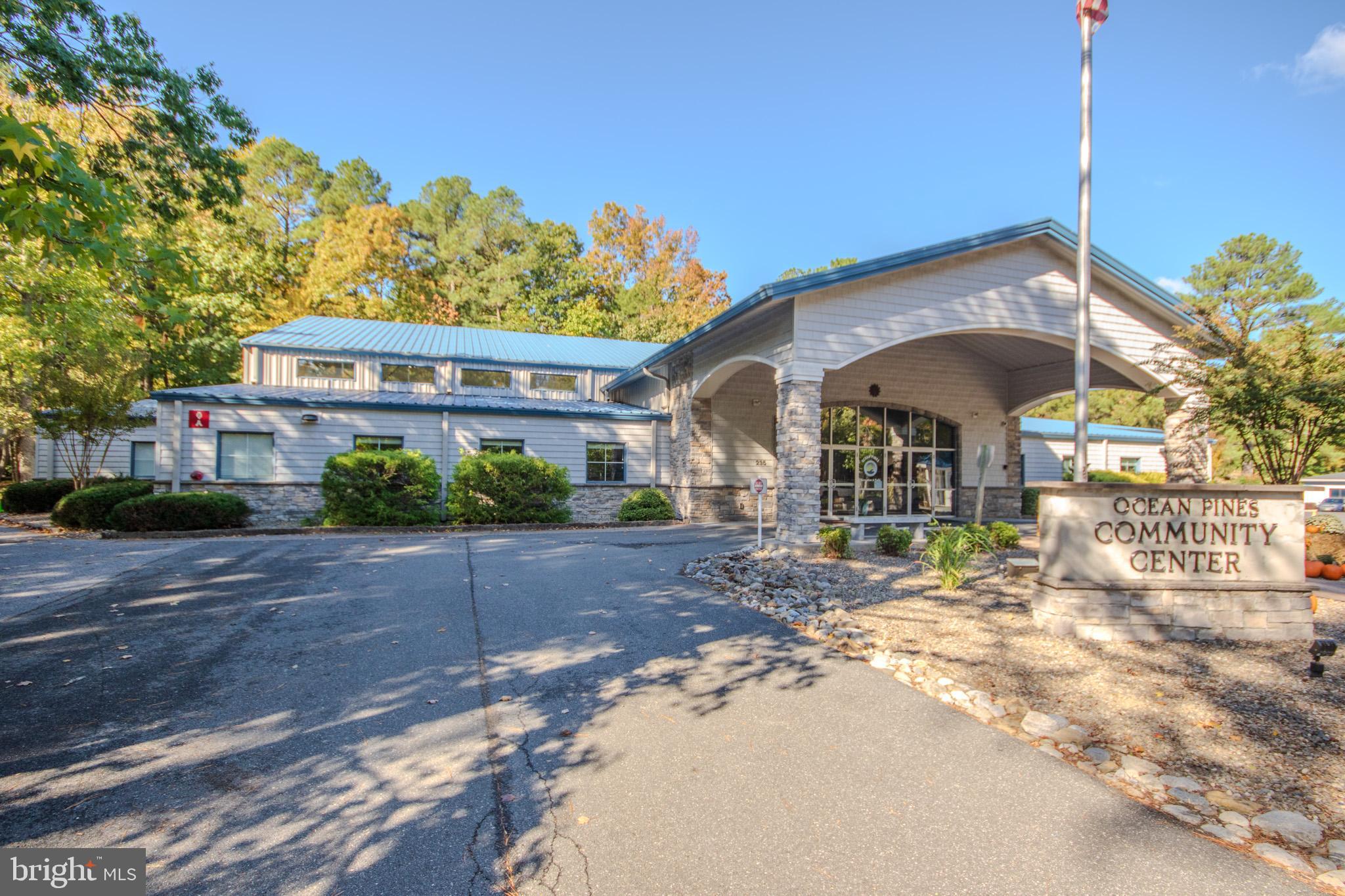 103 Ocean Parkway Ocean Pines, MD 21811 - Photo 34 of 44 a front view of a house with a yard