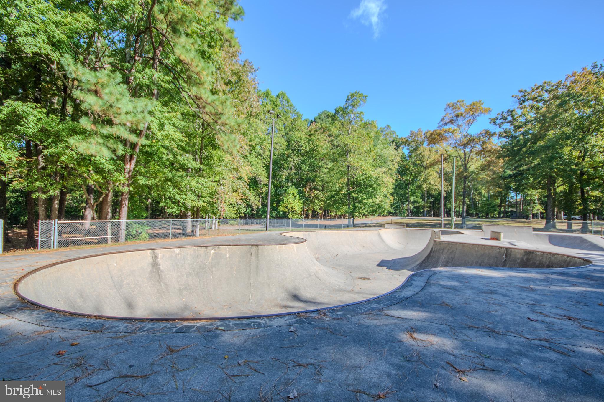 103 Ocean Parkway Ocean Pines, MD 21811 - Photo 36 of 44 a view of a swimming pool with a yard
