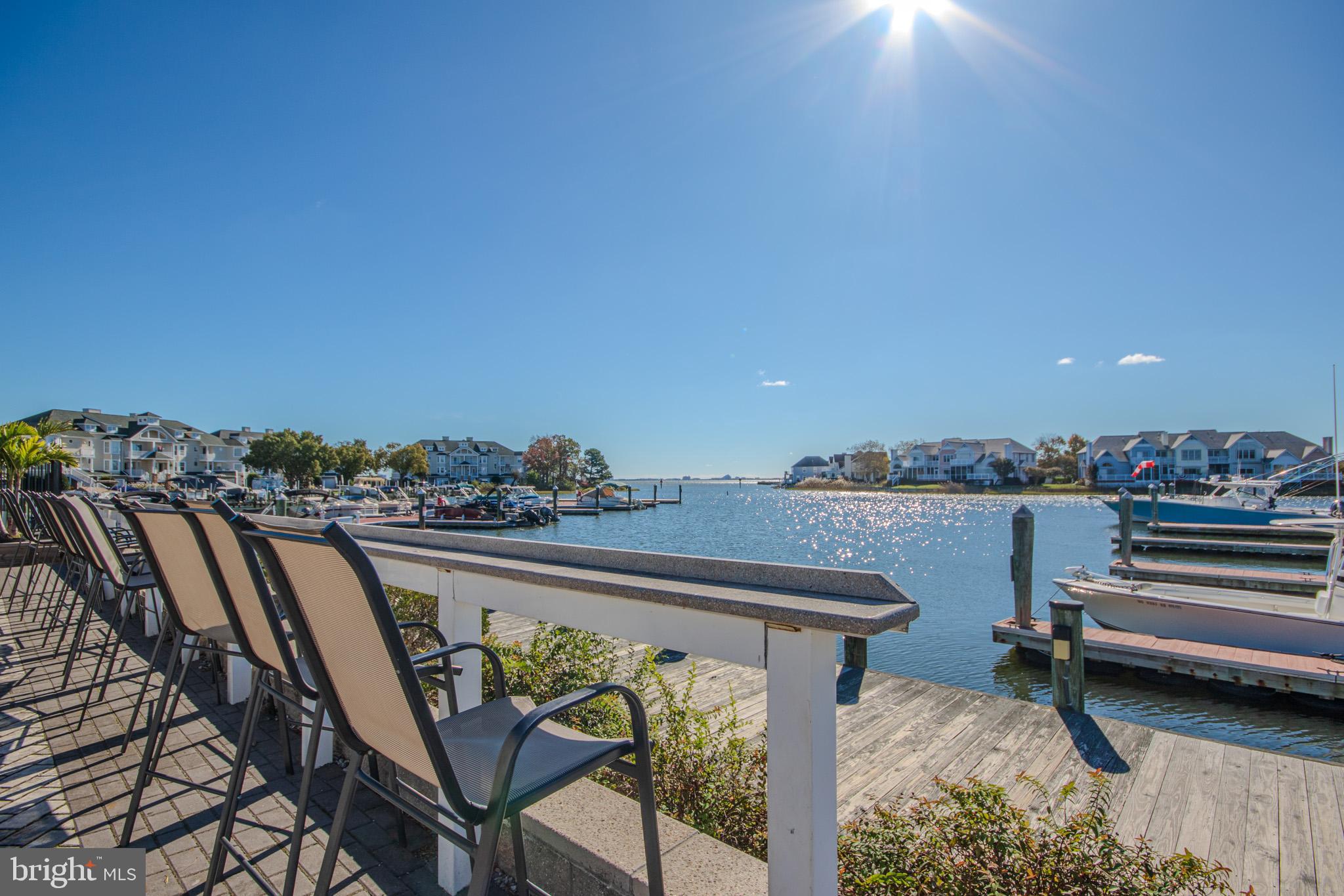 103 Ocean Parkway Ocean Pines, MD 21811 - Photo 41 of 44 a view of a terrace with furniture and city view