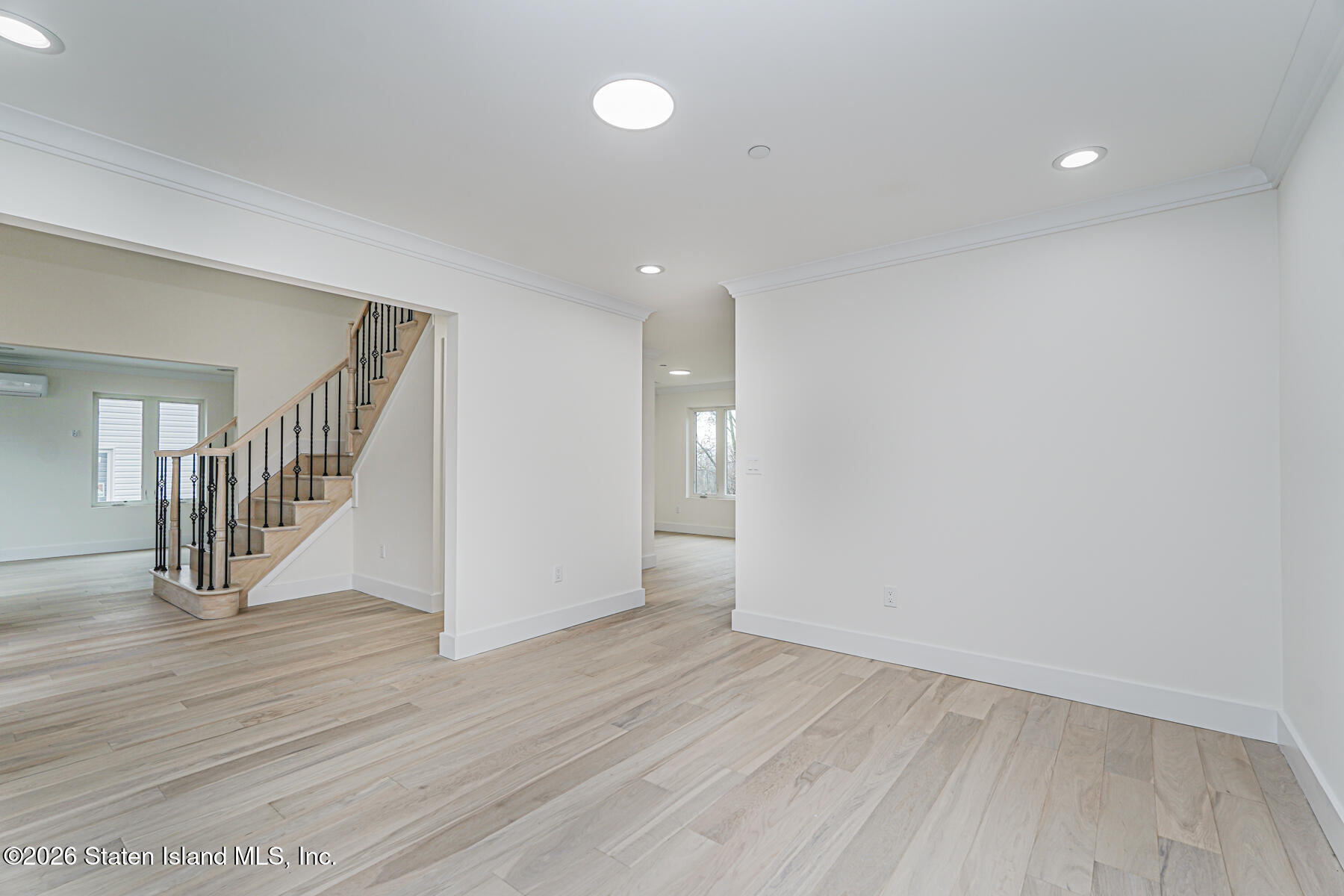 54 Cedarcliff Road Staten Island, NY 10301 - Photo 19 of 49 a view of a hallway with wooden floor