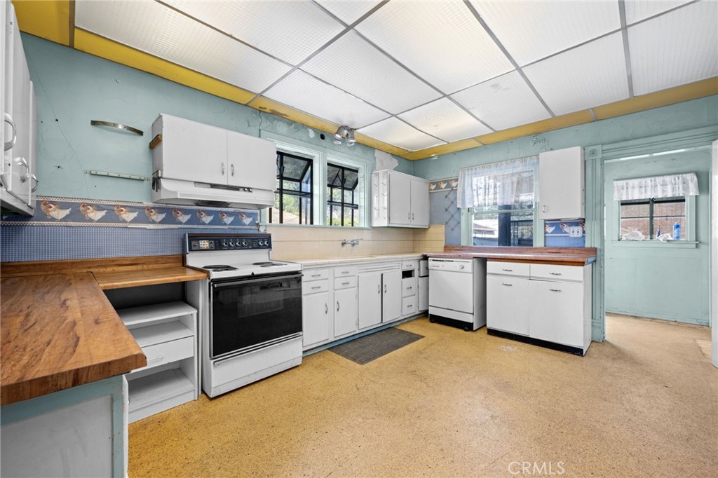 337 West Bennett Avenue Glendora, CA 91741 - Photo 14 of 67 a kitchen with stainless steel appliances granite countertop a stove sink and cabinets