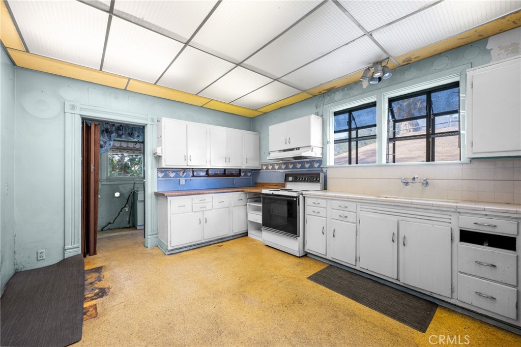337 West Bennett Avenue Glendora, CA 91741 - Photo 15 of 67 a kitchen with a sink cabinets and window