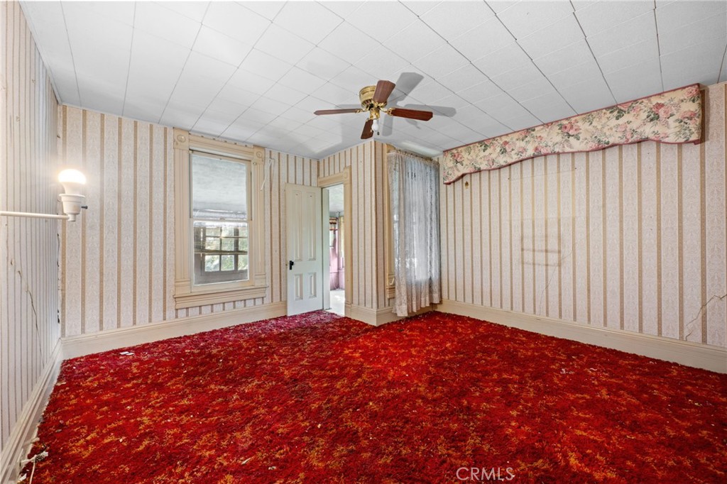 337 West Bennett Avenue Glendora, CA 91741 - Photo 20 of 67 a bedroom with a bed and a chandelier