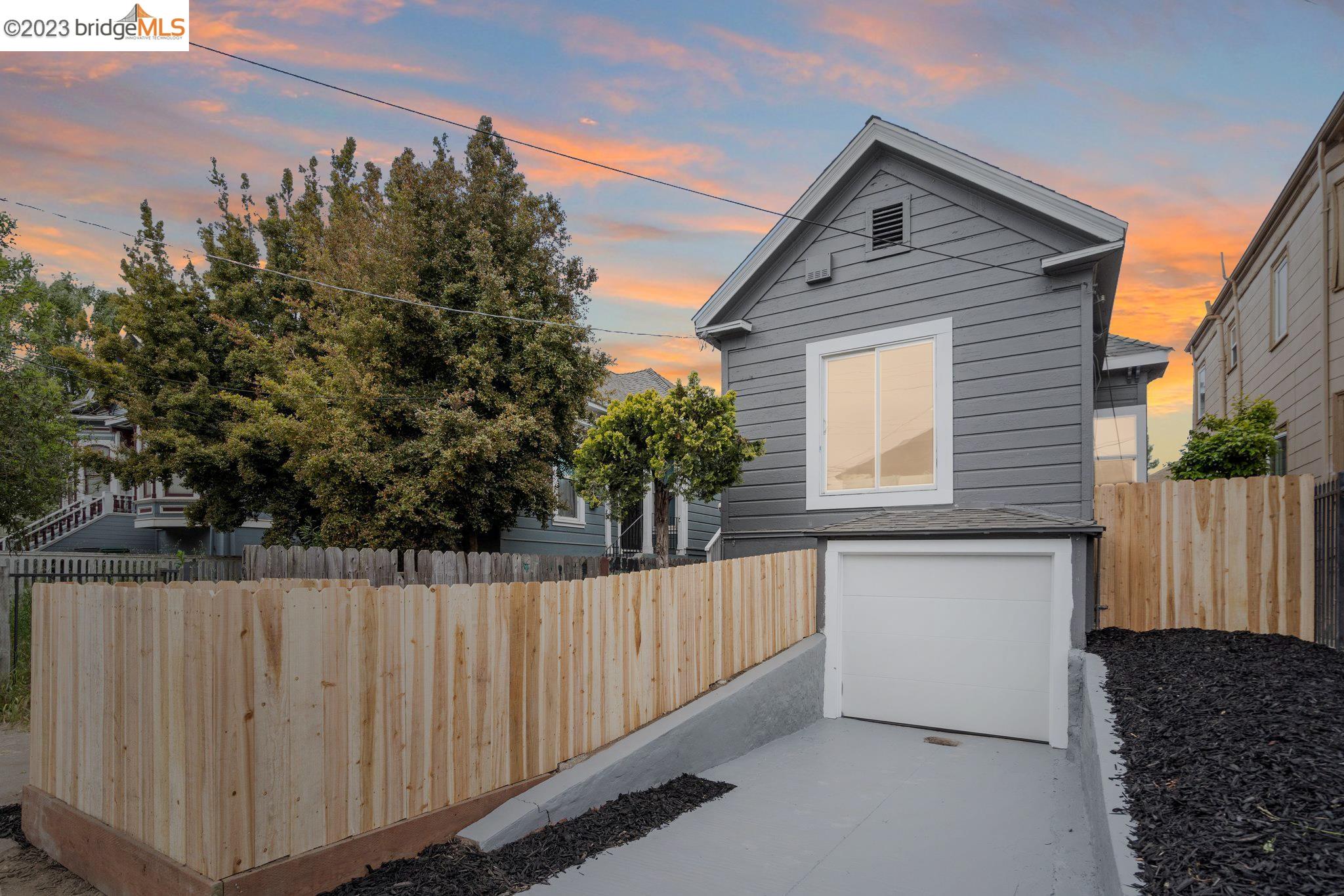 a house view with a backyard space