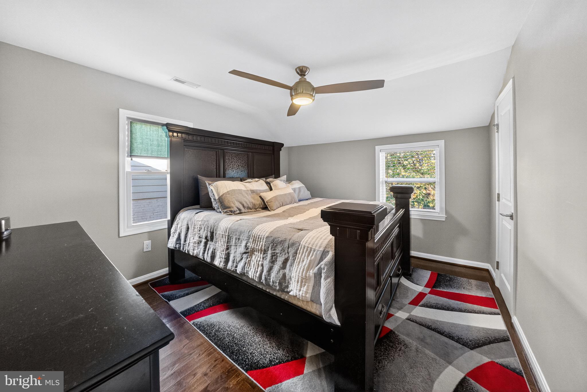 5211 Jay Street Northeast Washington, DC 20019 - Photo 8 of 17 a bedroom with a bed and a window