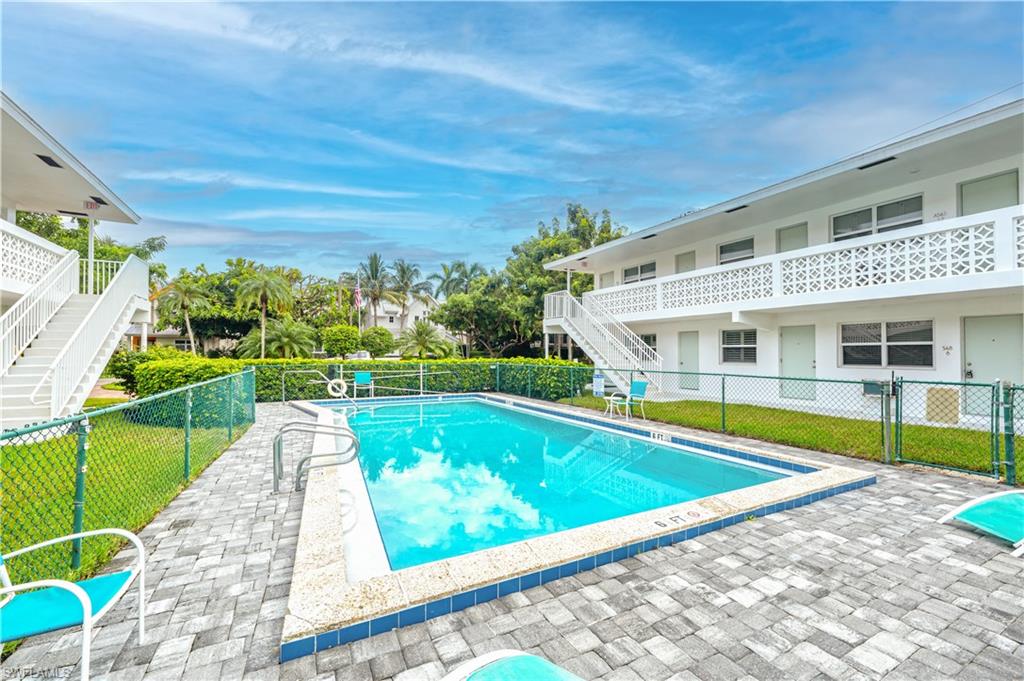 532 4th Avenue South, Unit 2 Naples, FL 34102 - Photo 12 of 19 a view of a house with swimming pool