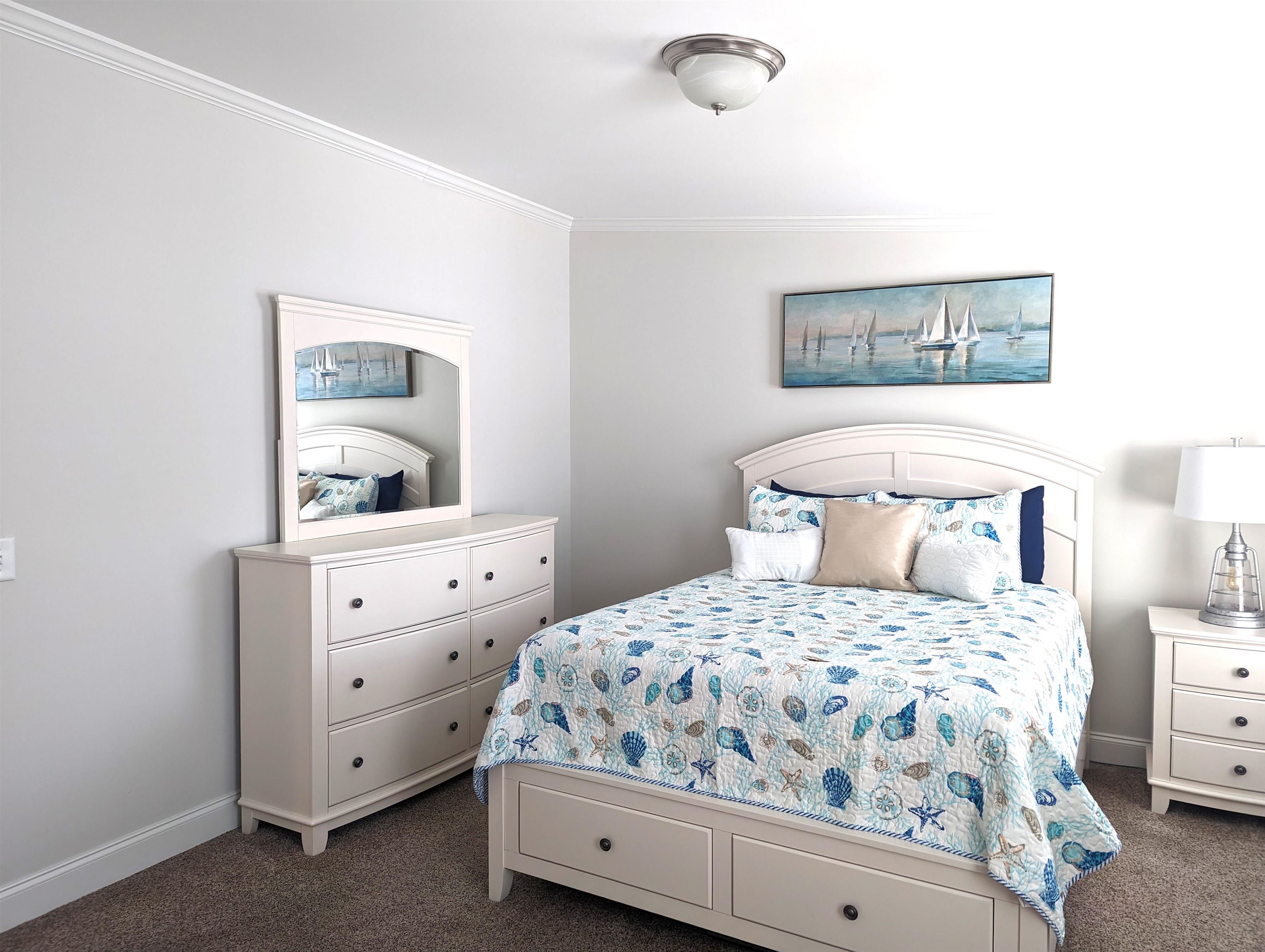 2058 S Shore Ocean View, NJ 08246 - Photo 19 of 27 a bedroom with a bed and a night stand