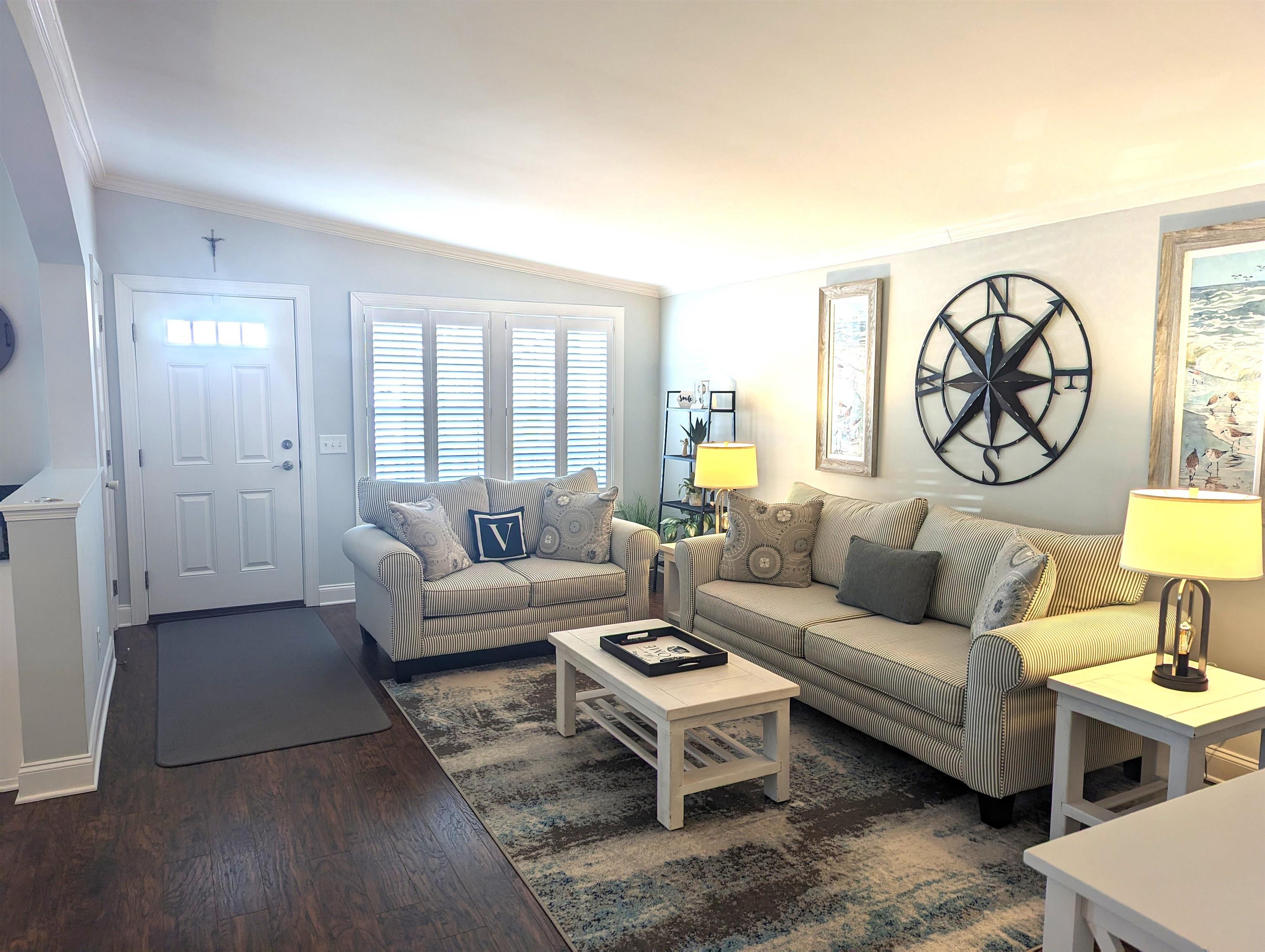 2058 S Shore Ocean View, NJ 08246 - Photo 4 of 27 a living room with furniture a rug a lamp and a window