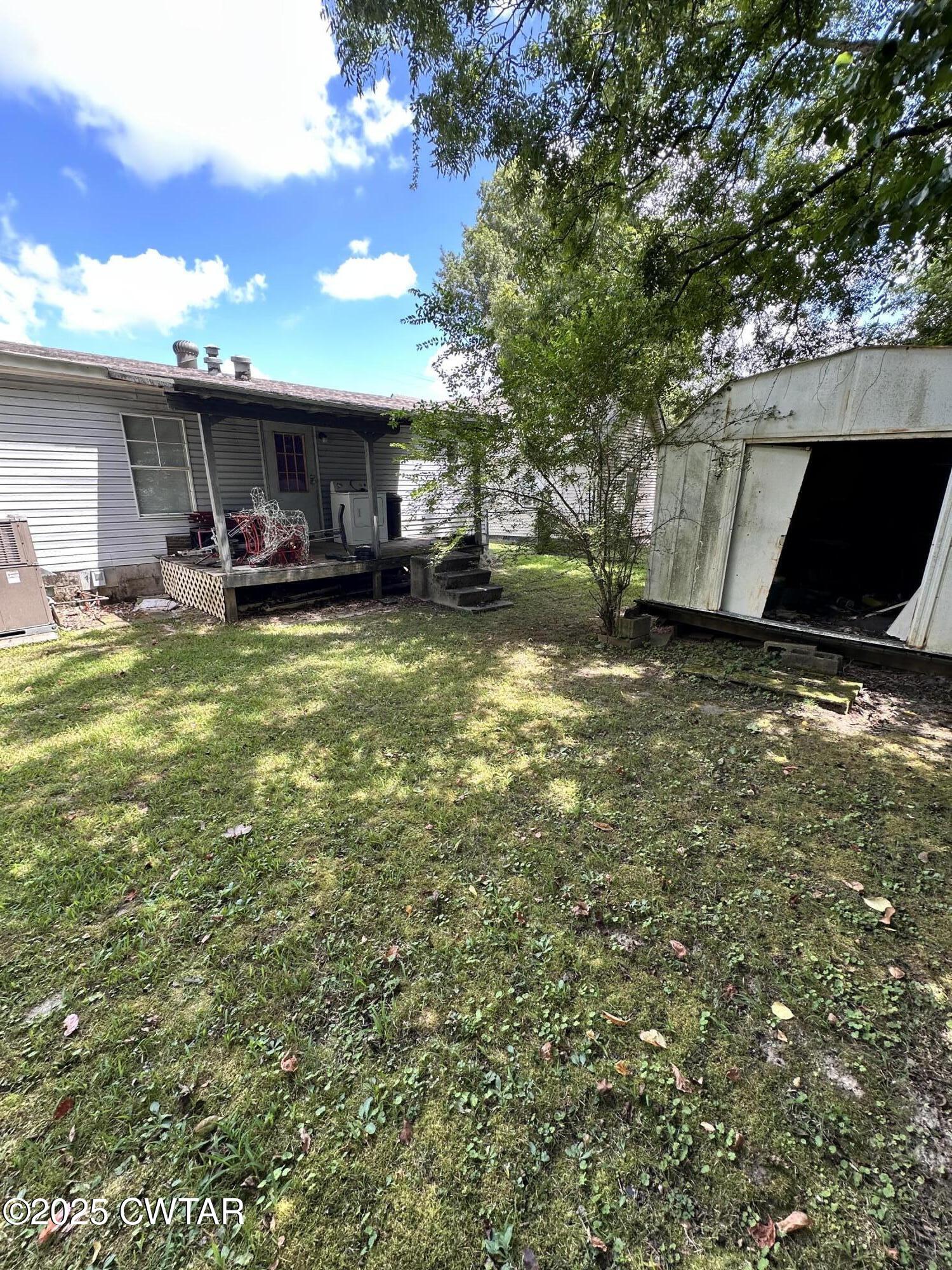 1730 Stallings Road Humboldt, TN 38343 - Photo 18 of 21 a view of a house with a yard