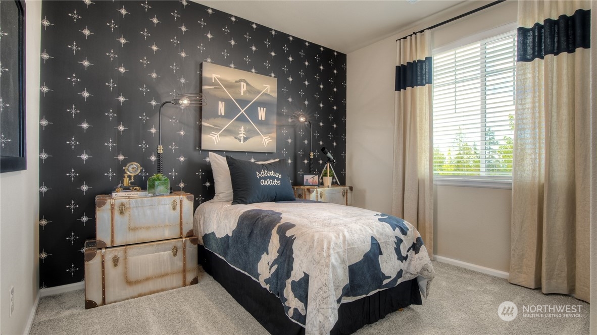 1017 Panoramic Loop, Unit 95 Bremerton, WA 98312 - Photo 11 of 14 a bedroom with a bed and a window