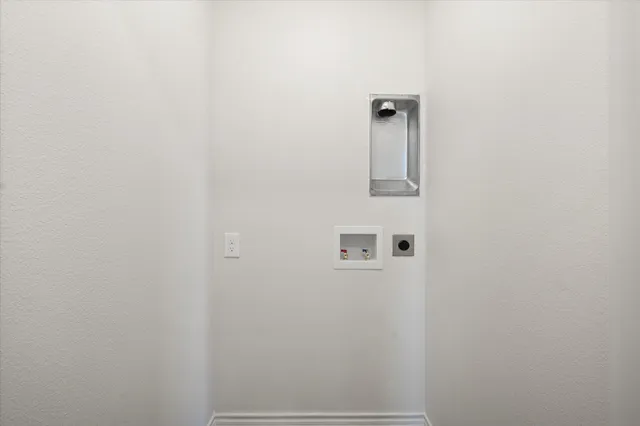 a bed room with a bed and a night stand