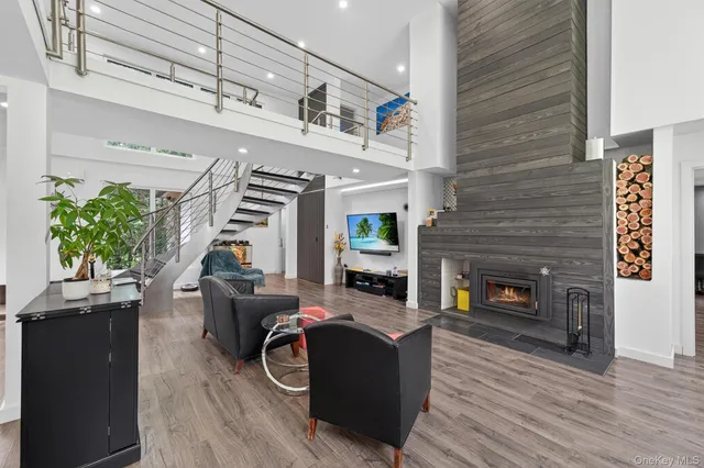 a view of a patio with a table chairs and a backyard